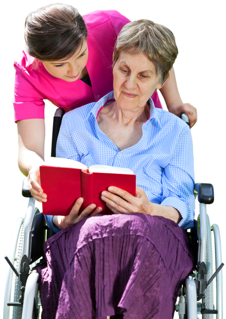 caregiver assisting senior woman to read a book